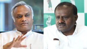 Image of Priyank Kharge with HD Kumaraswamy
